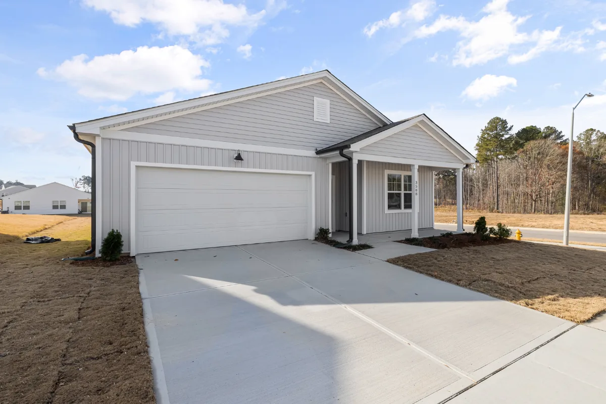 Newly finished concrete driveway at a new construction home in Western NC - The Western NC Concrete Company